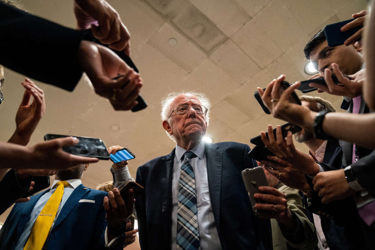 Sen. Bernie Sanders speaks with reporters in the Senate Subway on Capitol Hill on July 21, 2021.