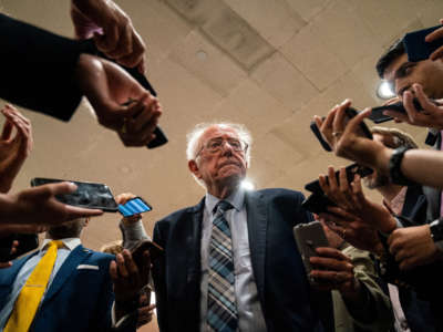 Sen. Bernie Sanders speaks with reporters in the Senate Subway on Capitol Hill on July 21, 2021.