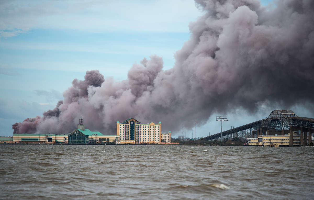 Smoke rises from a burning chemical plant after the passing of Hurricane Laura in Lake Charles, Louisiana, on August 27, 2020.