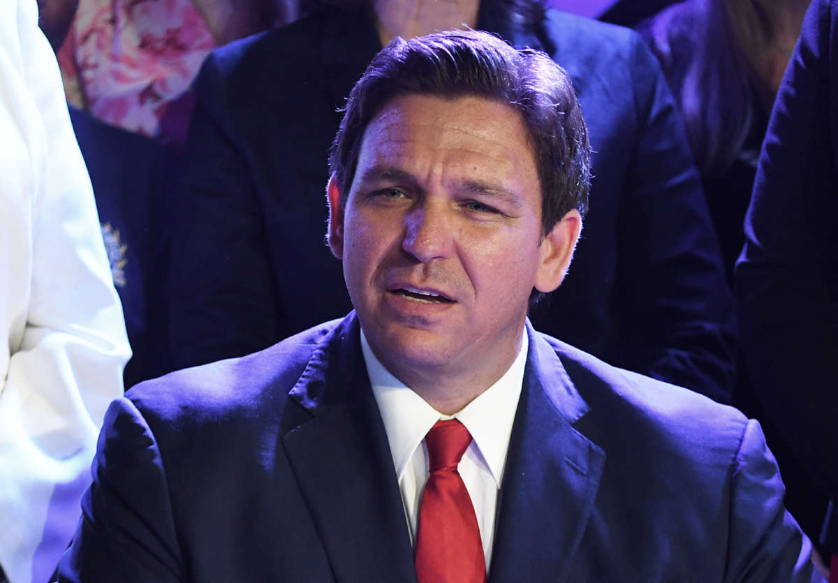 Florida Gov. Ron DeSantis signs Florida's 15-week abortion ban into law at Nacion de Fe church in Kissimmee, Florida.