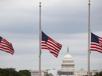 Flags fly at half mast for the one million people in the u.s. killed by covid