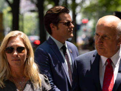 From left, Representatives Marjorie Taylor Greene, Matt Gaetz and Louie Gohmert unsuccessfully try to gain entry to the U.S. Department of Justice on July 27, 2021, in Washington, D.C.