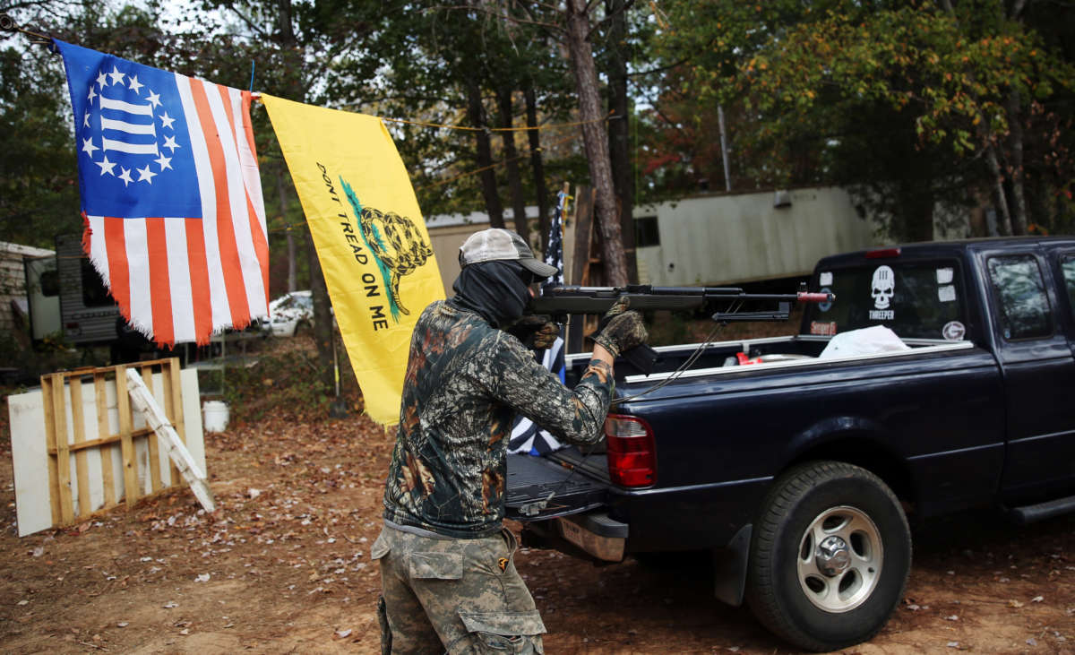 A member of the white supremacist Georgia Security Forces (GSF) is seen during military drill with group members of III% Georgia Security Force in Flovilla, Georgia, on November 12, 2016.