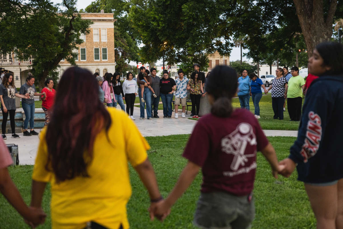 Members of the community gather at the City of Uvalde Town Square for a vigil in the wake of a mass shooting at Robb Elementary School on May 24, 2022, in Uvalde, Texas.