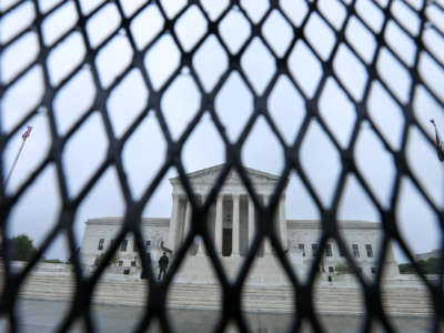 Riot fencing surrounds the U.S. Supreme Court in Washington, D.C., on May 7, 2022.