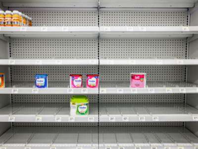 Shelves normally meant for baby formula sit nearly empty at a store in downtown Washington, D.C., on May 22, 2022.