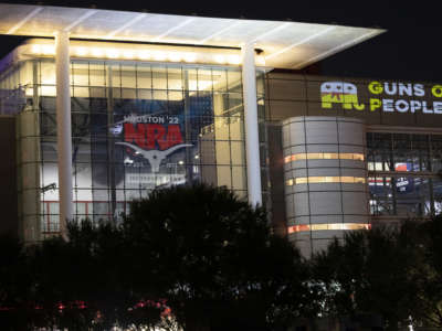 "GOP: Guns Over People" is projected outside the NRA Convention on May 27, 2022, in Houston, Texas.