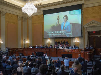 A video of former special assistant to the president Cassidy Hutchinson is shown on a screen during the fifth hearing held by the Select Committee to Investigate the January 6th Attack on the U.S. Capitol on June 23, 2022, in the Cannon House Office Building in Washington, D.C.