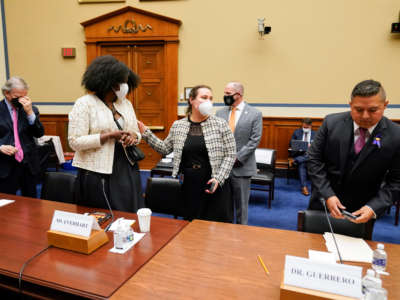 People arrive to testify before a House Committee on Oversight and Reform hearing on gun violence on Capitol Hill on June 8, 2022, in Washington, D.C.