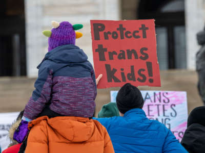 People demonstrate in support of transgender rights in St. Paul, Minnesota, on March 6, 2022.