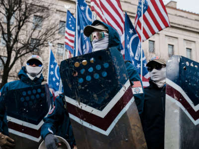 Members of the right-wing group Patriot Front prepare to march with anti-abortion activists during the 49th annual March for Life along Constitution Ave. on January 21, 2022 in Washington, D.C.
