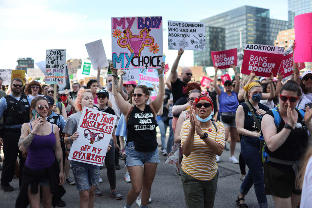 Abortion rights demonstrators march into downtown following a rally in Union Park on May 14, 2022, in Chicago, Illinois.