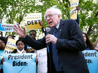 Sen. Bernie Sanders joins student debtors to again call on President Biden to cancel student debt at an early morning action outside the White House on April 27, 2022, in Washington, D.C.