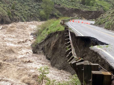 In this handout photo provided by the National Park Service, water levels in Gardner River rise alongside the North Entrance Road in Yellowstone National Park on June 13, 2022, in Gardiner, Montana.