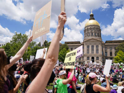 Activists rally outside the State Capitol in support of abortion rights in Atlanta, Georgia, on May 14, 2022.