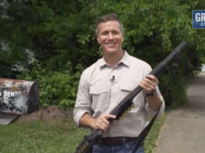Missouri Republican Senate candidate Eric Greitens wields a shotgun in a campaign ad.
