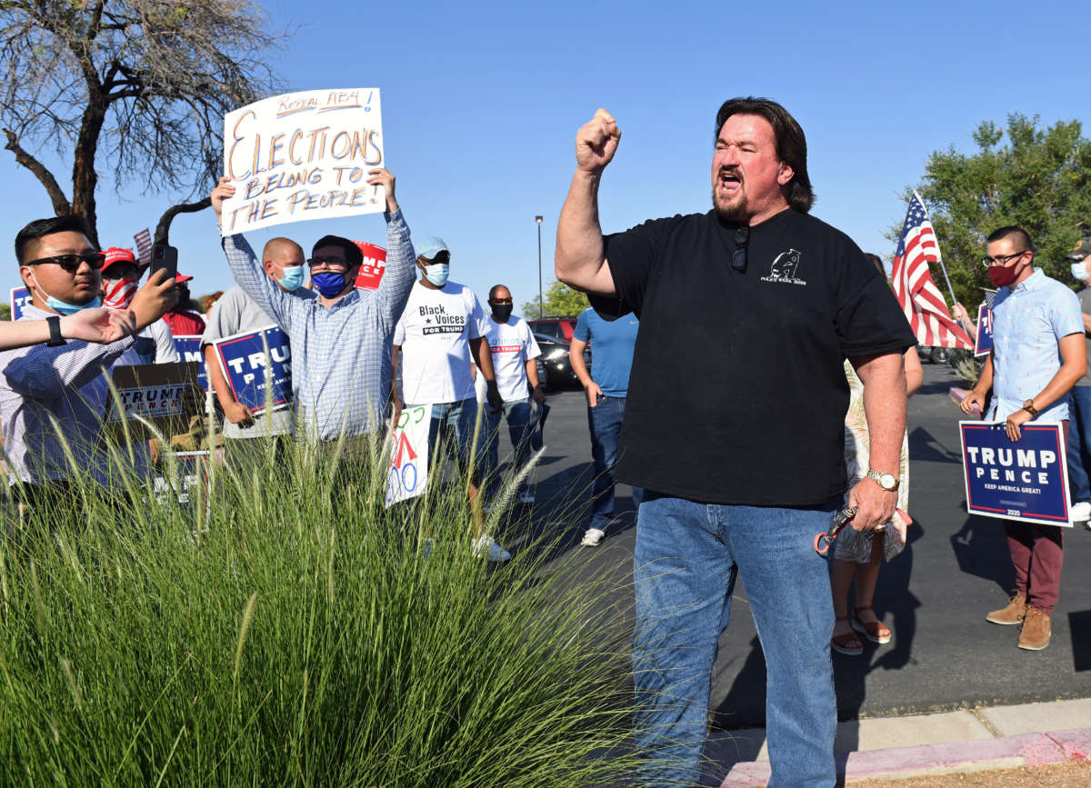 Nevada Republican Party Chairman Michael McDonald speaks to people gathered during a demonstration at the Grant Sawyer State Office Building on August 4, 2020, in Las Vegas, Nevada.