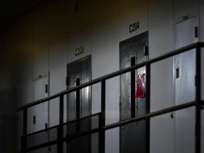 A red sign on a cell door signifies an active COVID-19 case for its inhabitants, at Faribault Prison on January 4, 2021, in Faribault, Minnesota.