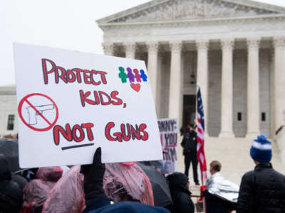 Supporters of gun control and firearm safety measures hold a protest rally outside the U.S. Supreme Court on December 2, 2019, in Washington, D.C.