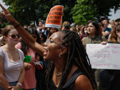 Abortion rights activists react after the announcement to the Dobbs v Jackson Women's Health Organization ruling in front of the U.S. Supreme Court on June 24, 2022, in Washington, D.C.