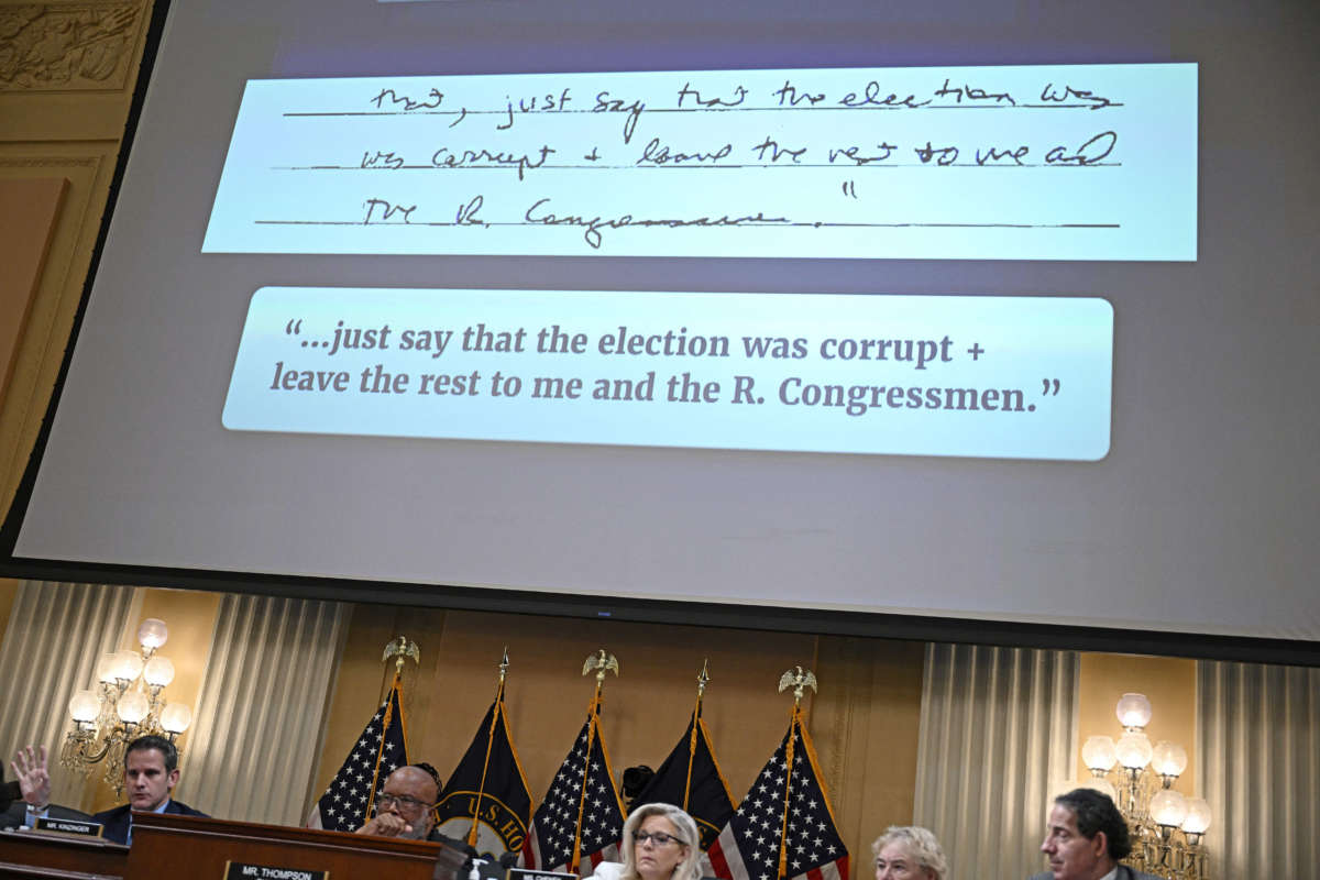 Former Acting Deputy Attorney General Richard Donoghue's handwritten notes appear onscreen during the fifth hearing by the House Select Committee to Investigate the January 6th Attack on the U.S. Capitol in the Cannon House Office Building in Washington, D.C., on June 23, 2022.