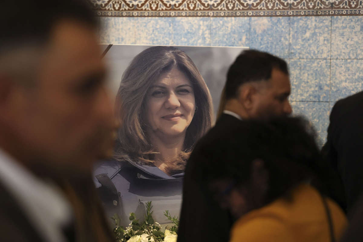 Mourners attend a memorial ceremony for Shireen Abu Akleh, to mark the 40th day of the killing of the Al Jazeera journalist, in the West Bank city of Ramallah on June 19, 2022.