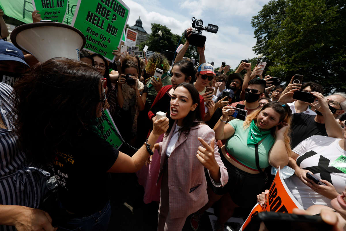 Rep. Alexandria Ocasio-Cortez speaks to abortion rights activists in front of the U.S. Supreme Court on June 24, 2022, in Washington, D.C.