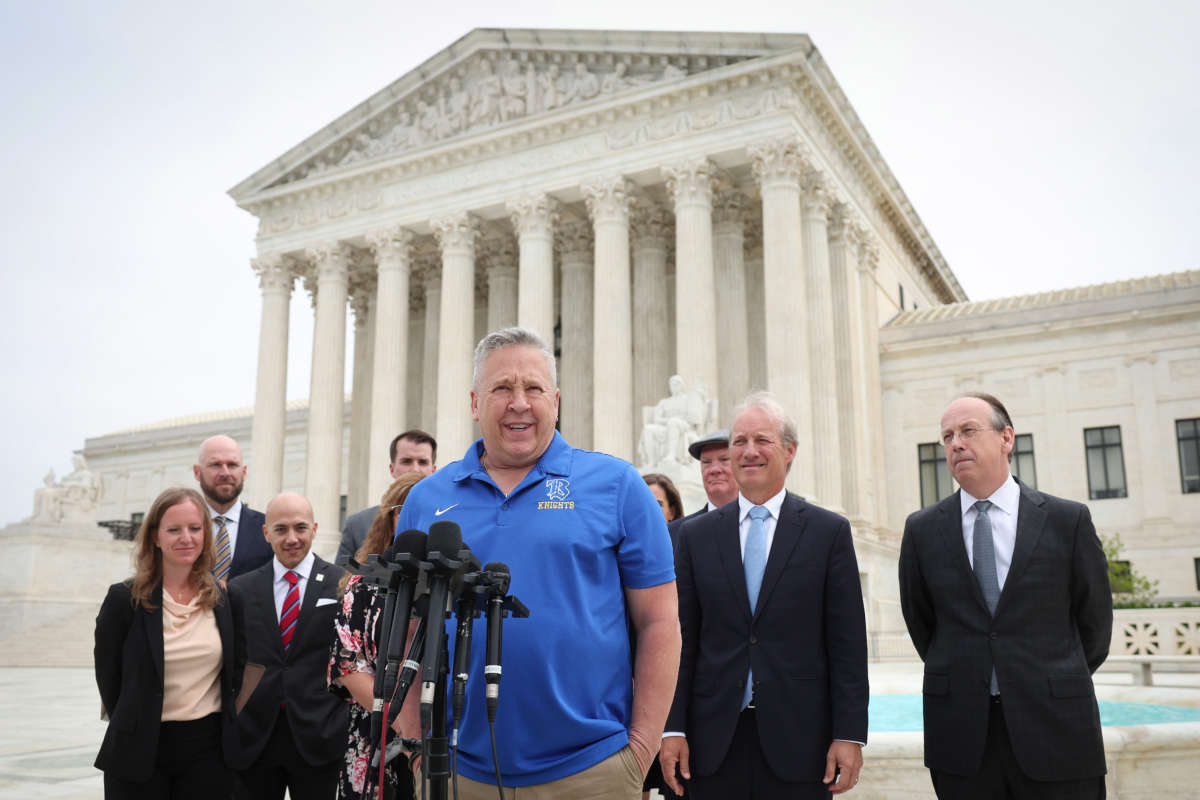 Former Bremerton High School assistant football coach Joe Kennedy answers questions after his legal case, Kennedy vs. Bremerton School District, was argued before the Supreme Court on April 25, 2022, in Washington, D.C.