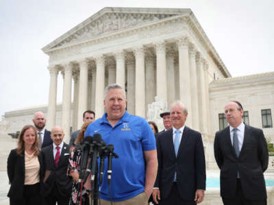 Former Bremerton High School assistant football coach Joe Kennedy answers questions after his legal case, Kennedy vs. Bremerton School District, was argued before the Supreme Court on April 25, 2022, in Washington, D.C.