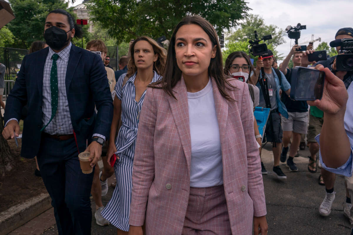 Rep. Alexandria Ocasio-Cortez leaves after speaking to abortion rights activists in front of the U.S. Supreme Court on June 24, 2022, in Washington, D.C.