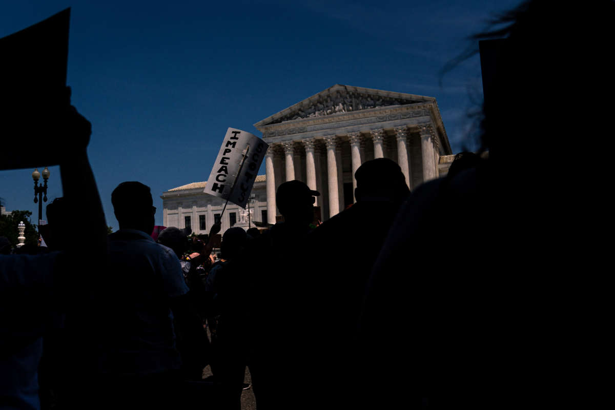 Abortion rights activists gather in front of the Supreme Court following the 6-3 ruling in Dobbs v. Jackson Women's Health Organization on June 26, 2022, in Washington, D.C.
