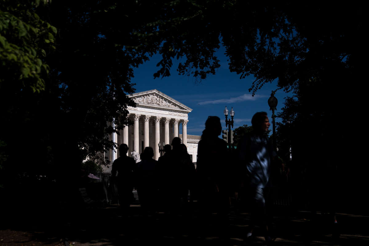Tourists walk past the Supreme Court on June 28, 2022, in Washington, D.C.