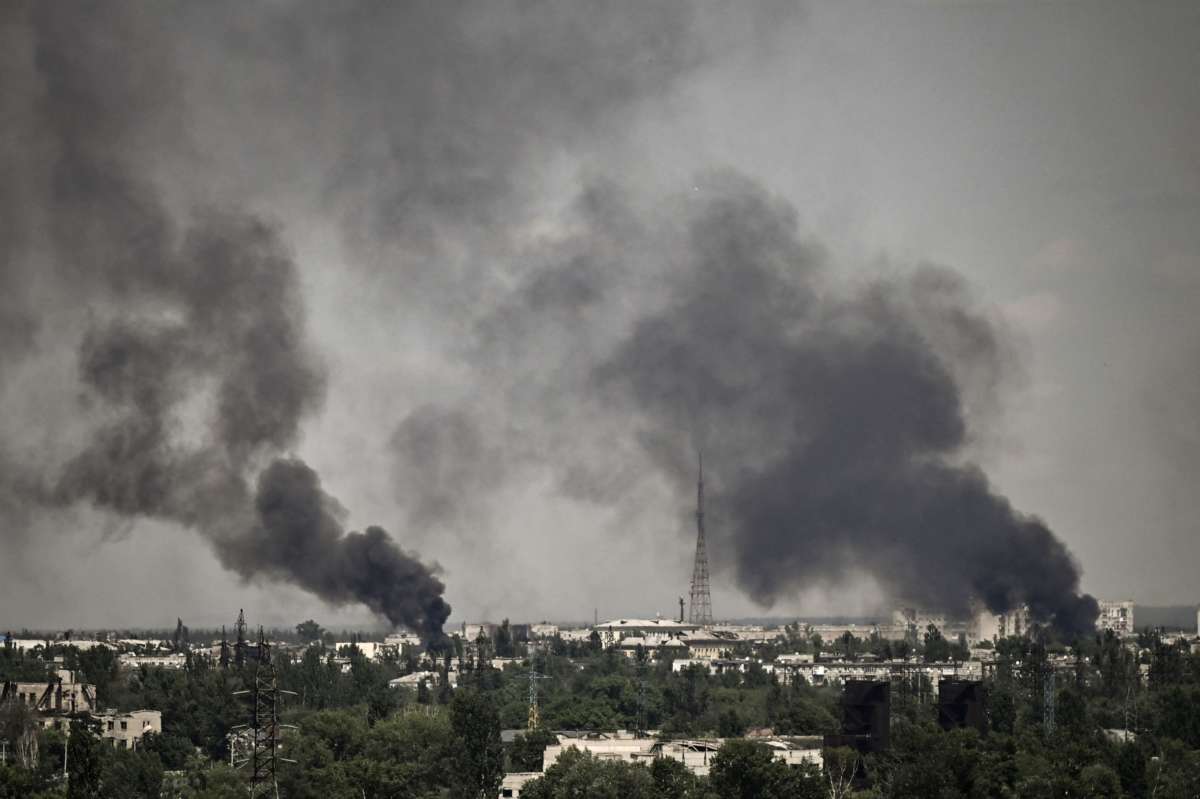 Smoke rises in the city of Severodonetsk during heavy fighting between Ukrainian and Russian troops at eastern Ukrainian region of Donbas on May 30, 2022.