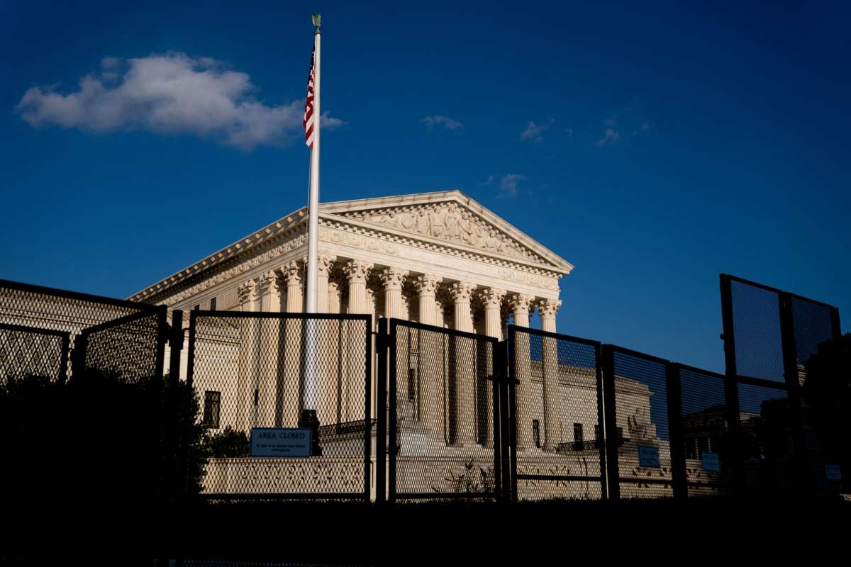 The Supreme Court is seen behind a fence after overturning Roe v. Wade, in Washington, D.C., on June 24, 2022.