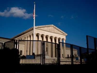 The Supreme Court is seen behind a fence after overturning Roe v. Wade, in Washington, D.C., on June 24, 2022.