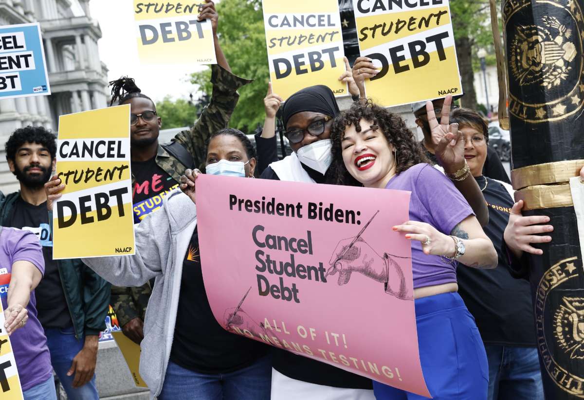 Student loan borrowers gather near the White House to tell President Biden to cancel student debt on May 12, 2022, in Washington, D.C.