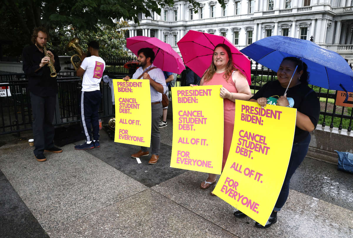 Student debt borrowers gather with a brass band for their monthly “Cancel Student Debt — All of it for All” action as President Joe Biden considers a decision on student debt outside The White House on June 7, 2022, in Washington, D.C.