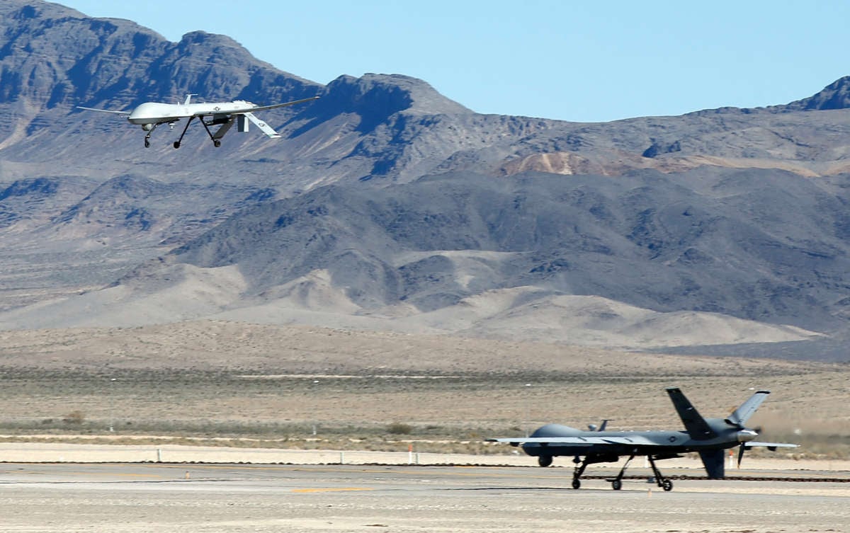 An MQ-1B Predator remotely piloted aircraft flies during a military training session
