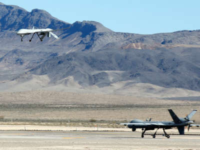 An MQ-1B Predator remotely piloted aircraft flies during a military training session