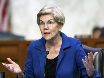 U.S. Sen. Elizabeth Warren (D-Massachusetts) questions Jerome Powell, Chairman, Board of Governors of the Federal Reserve System as he testifies before the Senate Banking, Housing, and Urban Affairs Committee on June 22, 2022 in Washington, D.C.