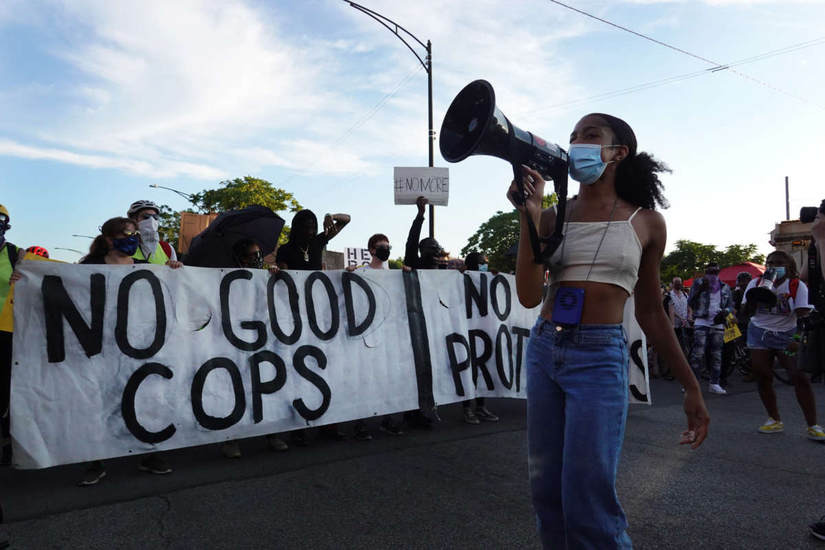 Activists march through the Lawndale neighborhood calling for the defunding of police on July 24, 2020, in Chicago, Illinois.
