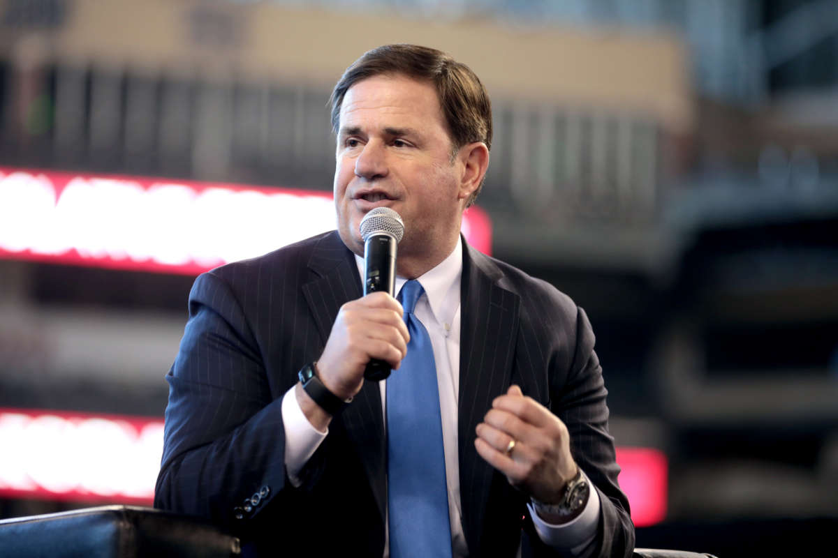 Arizona Gov. Doug Ducey speaks with attendees at the 2022 Legislative Forecast Luncheon hosted by the Arizona Chamber of Commerce & Industry at Chase Field in Phoenix, Arizona, on January 7, 2022.