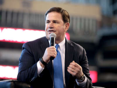 Arizona Gov. Doug Ducey speaks with attendees at the 2022 Legislative Forecast Luncheon hosted by the Arizona Chamber of Commerce & Industry at Chase Field in Phoenix, Arizona, on January 7, 2022.