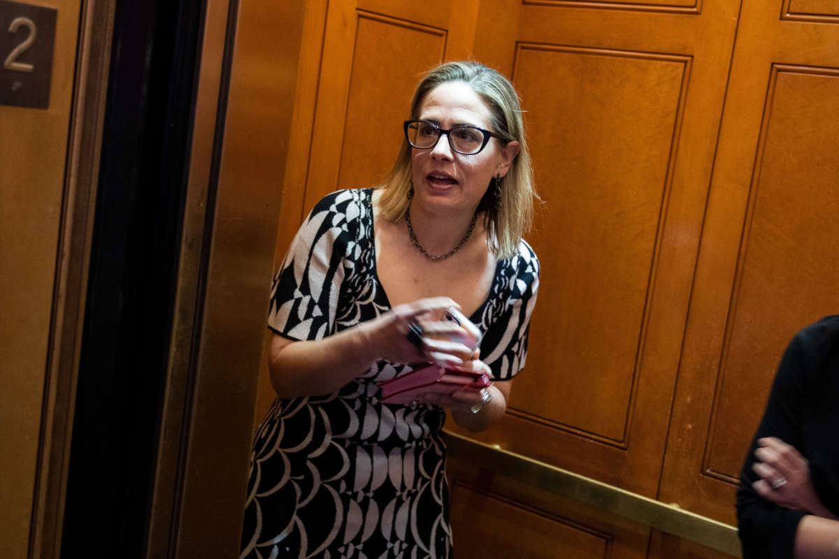 Sen. Kyrsten Sinema is seen in the U.S. Capitol during a senate vote on April 5, 2022.