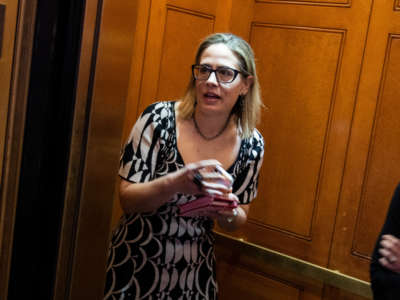 Sen. Kyrsten Sinema is seen in the U.S. Capitol during a senate vote on April 5, 2022.