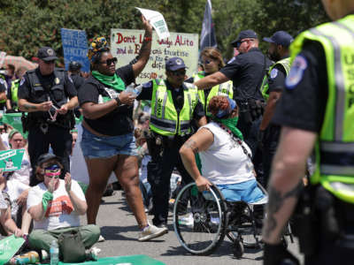 U.S. Capitol Police officers remove abortion rights activists as they protest outside the U.S. Supreme Court on the last day of their term on June 30, 2022, in Washington, D.C.