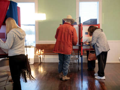 Voters cast their midterm ballots on November 6, 2018, at Briles Schoolhouse in Peoria Township, Kansas.
