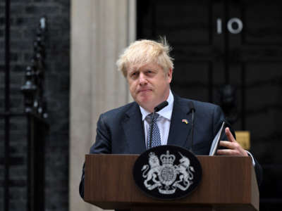 Britain's Prime Minister Boris Johnson makes a statement in front of 10 Downing Street in central London on July 7, 2022.