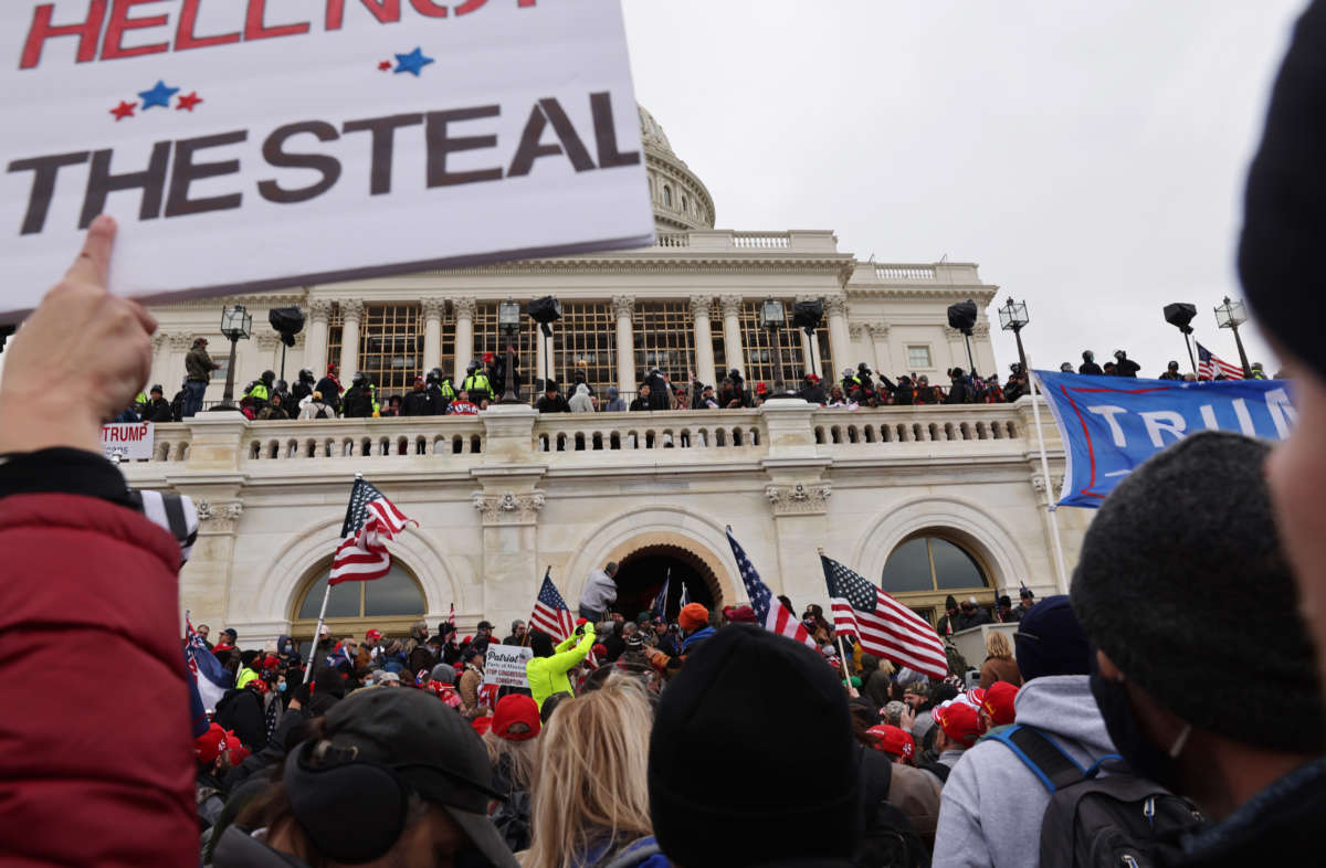 Trump supporters gather outside the U.S. Capitol building following a "Stop the Steal" rally on January 6, 2021, in Washington, D.C.