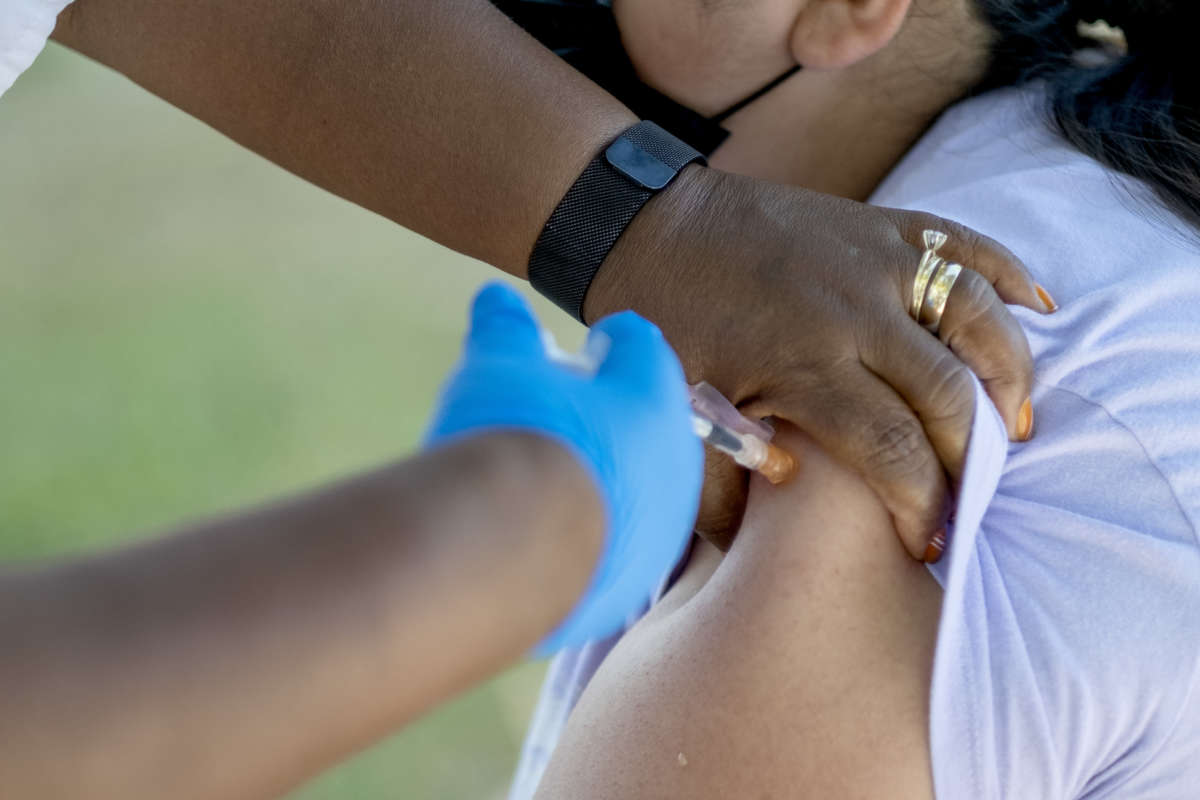 A patient receives the covid-19 vaccine